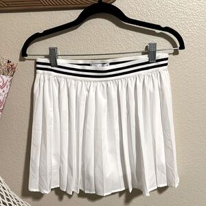 Vanilla Star Pleated White Mini Skirt with Black Accents